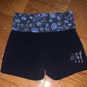 classic black shorts with floral waistband